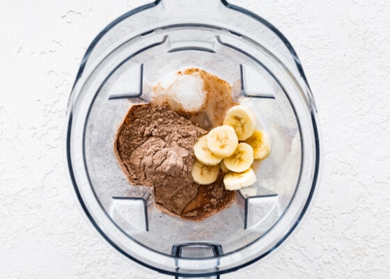 Ingredients for a muddy buddy protein shake in a blender.