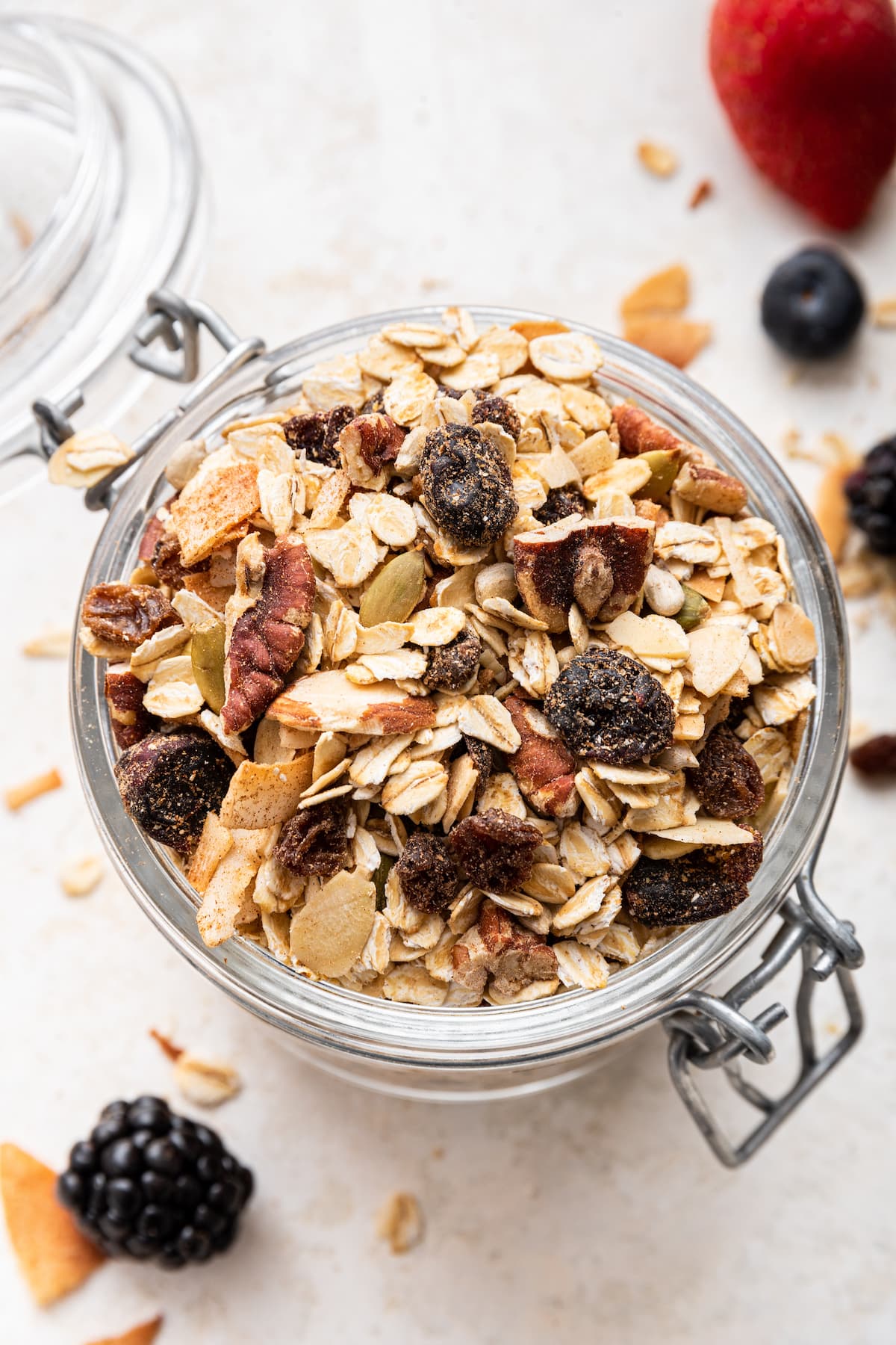 A glass jar filled with muesli.