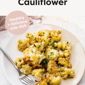 Roasted Cauliflower on a plate with a fork.