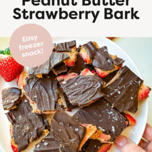 Chocolate Peanut Butter Strawberry Bark cut into pieces and on a plate.