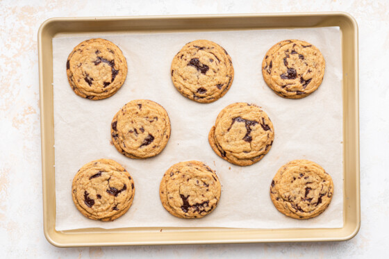 Brown butter chocolate chip cookies on a baking tray.