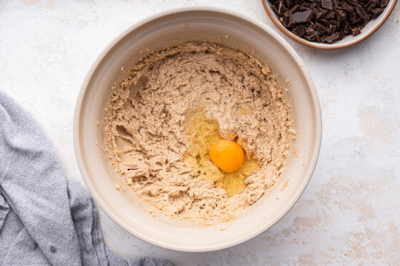 An egg added to the dough used for the brown butter chocolate chip cookies.