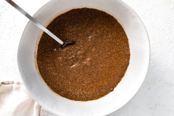 Chocolate chia seed pudding in a large mixing bowl.