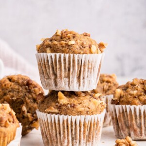 Two banana muffins stacked on one another.