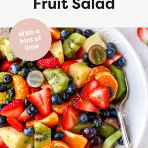 Bowl of fruit salad with some lime zest.