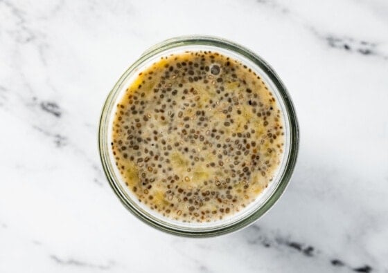 Banana chia pudding in a glass bowl.