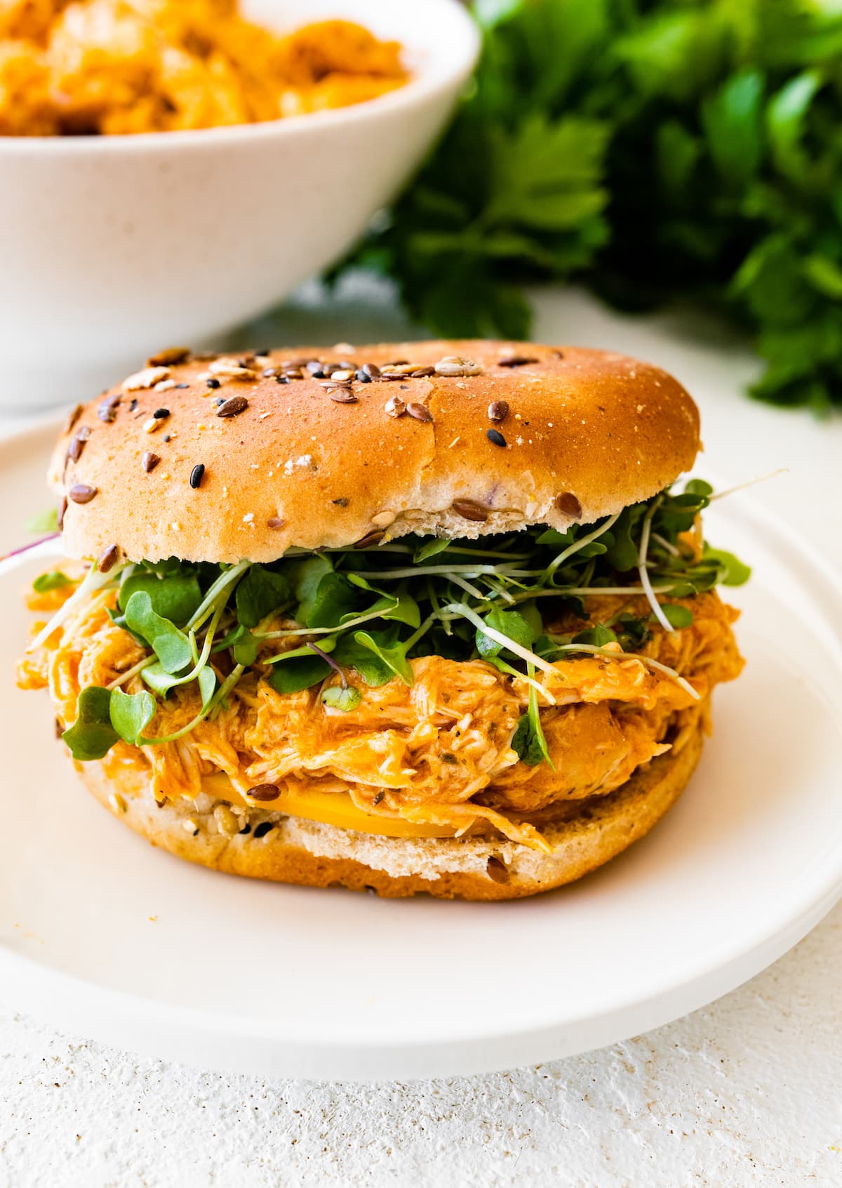 A buffalo chicken sandwich on a plate.