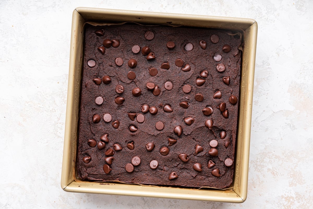 Sweet potato brownies in a square pan after being baked in the oven.