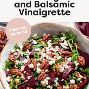 Beet Salad with Arugula and Balsamic Vinaigrette in a bowl.