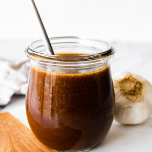 A balsamic vinaigrette in a glass jar.