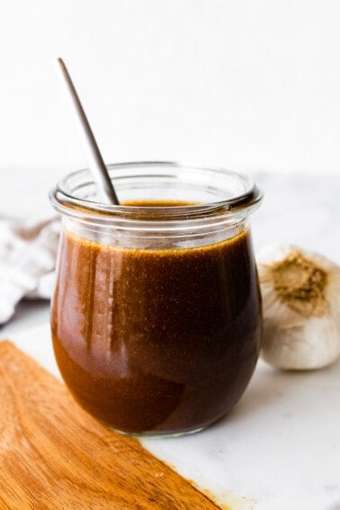 A balsamic vinaigrette in a glass jar.