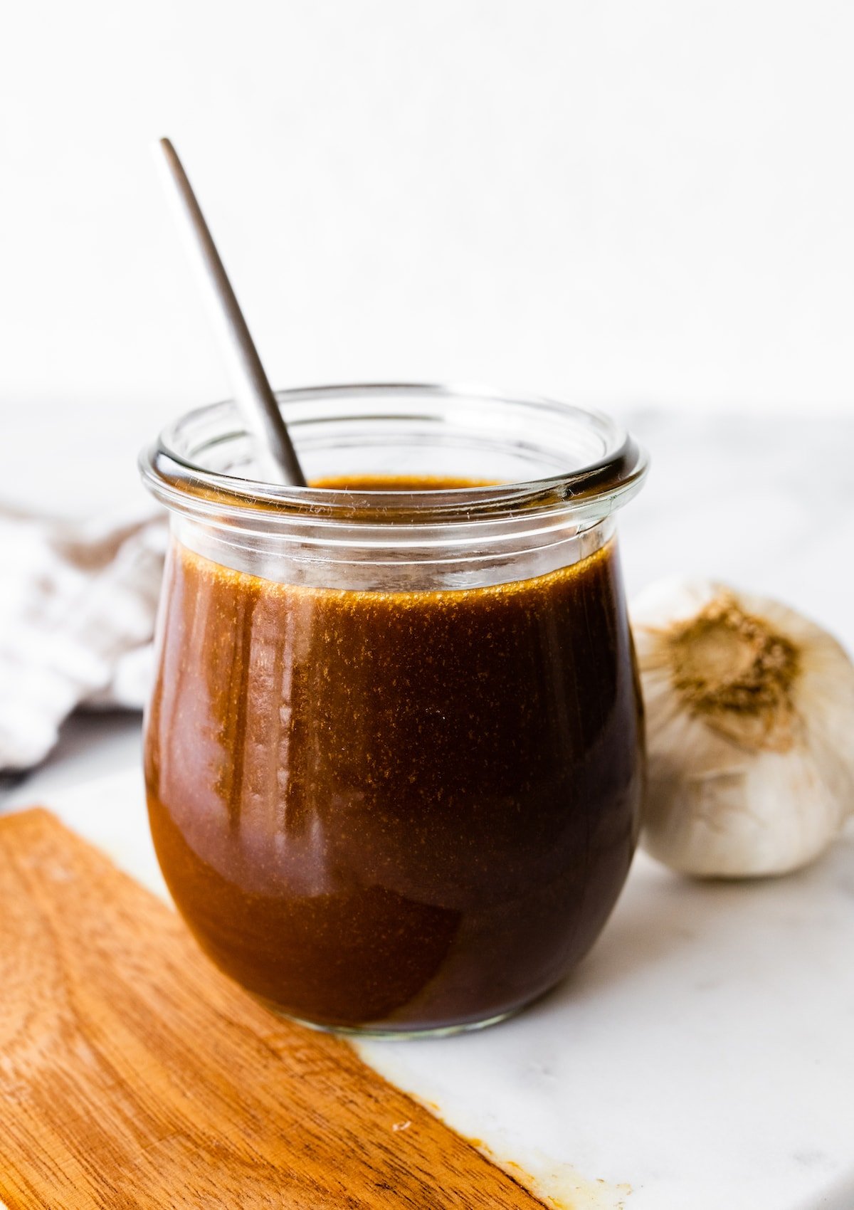 A balsamic vinaigrette in a glass jar.