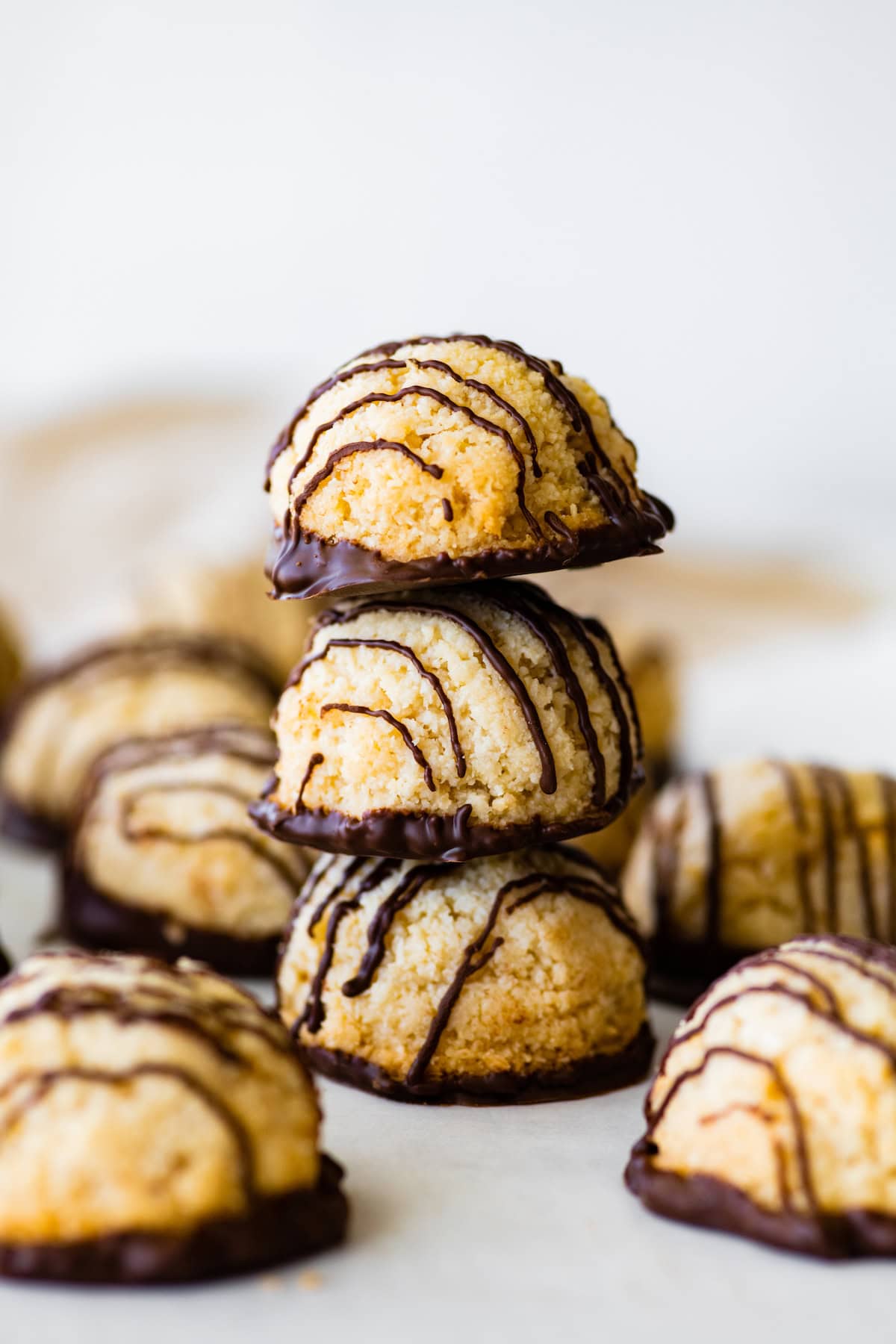 Three coconut macaroons stacked on one another.