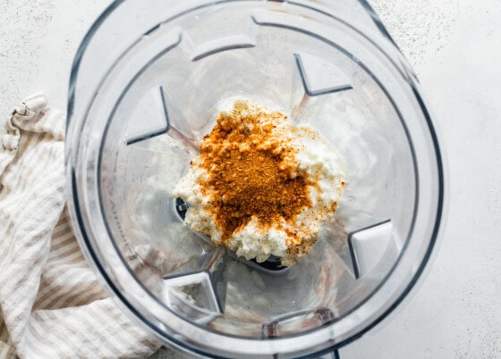 Cottage cheese and spices in a blender.