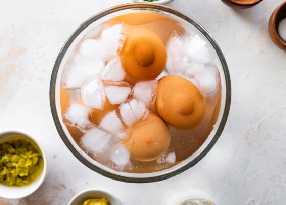 Eggs in a bowl of iced water.