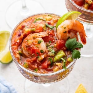 A mexican shrimp cocktail in a small glass.