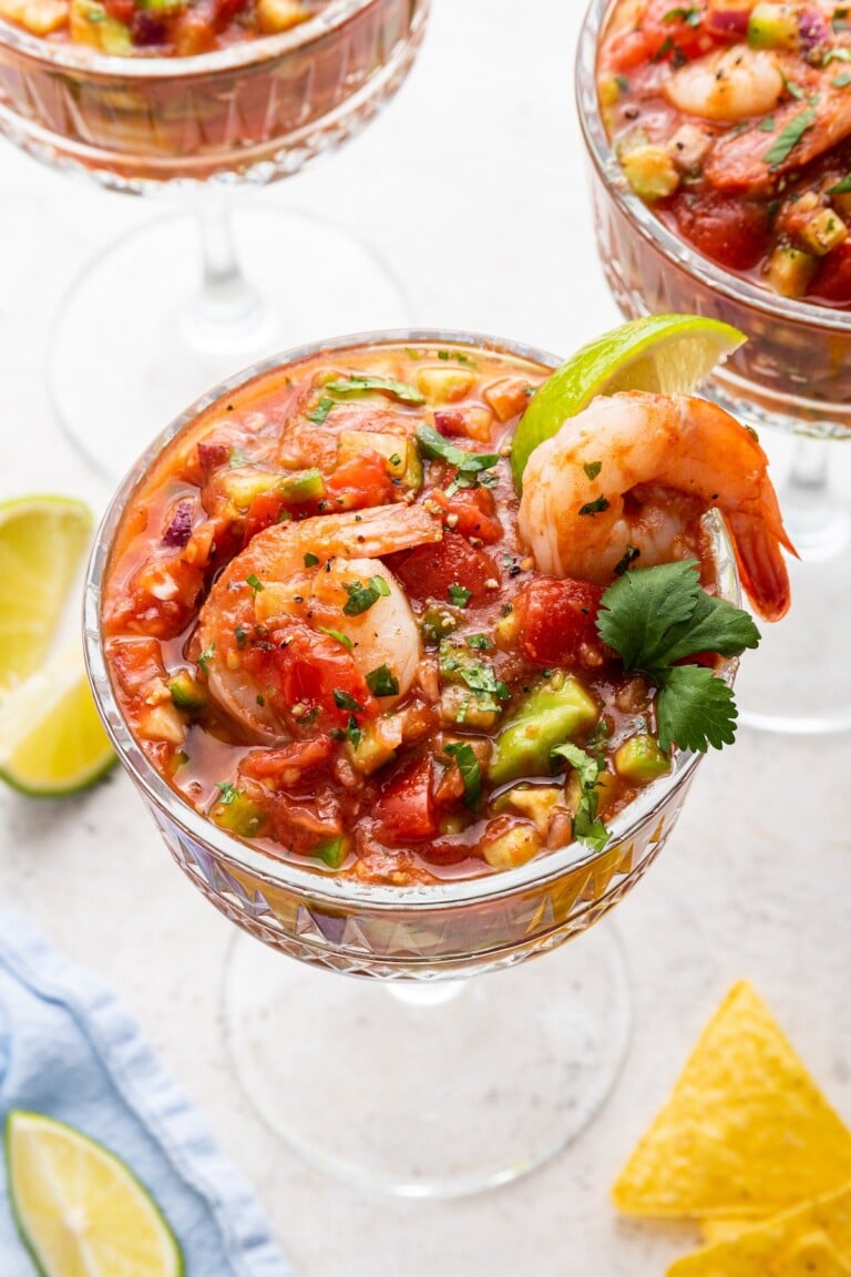 A mexican shrimp cocktail in a small glass.