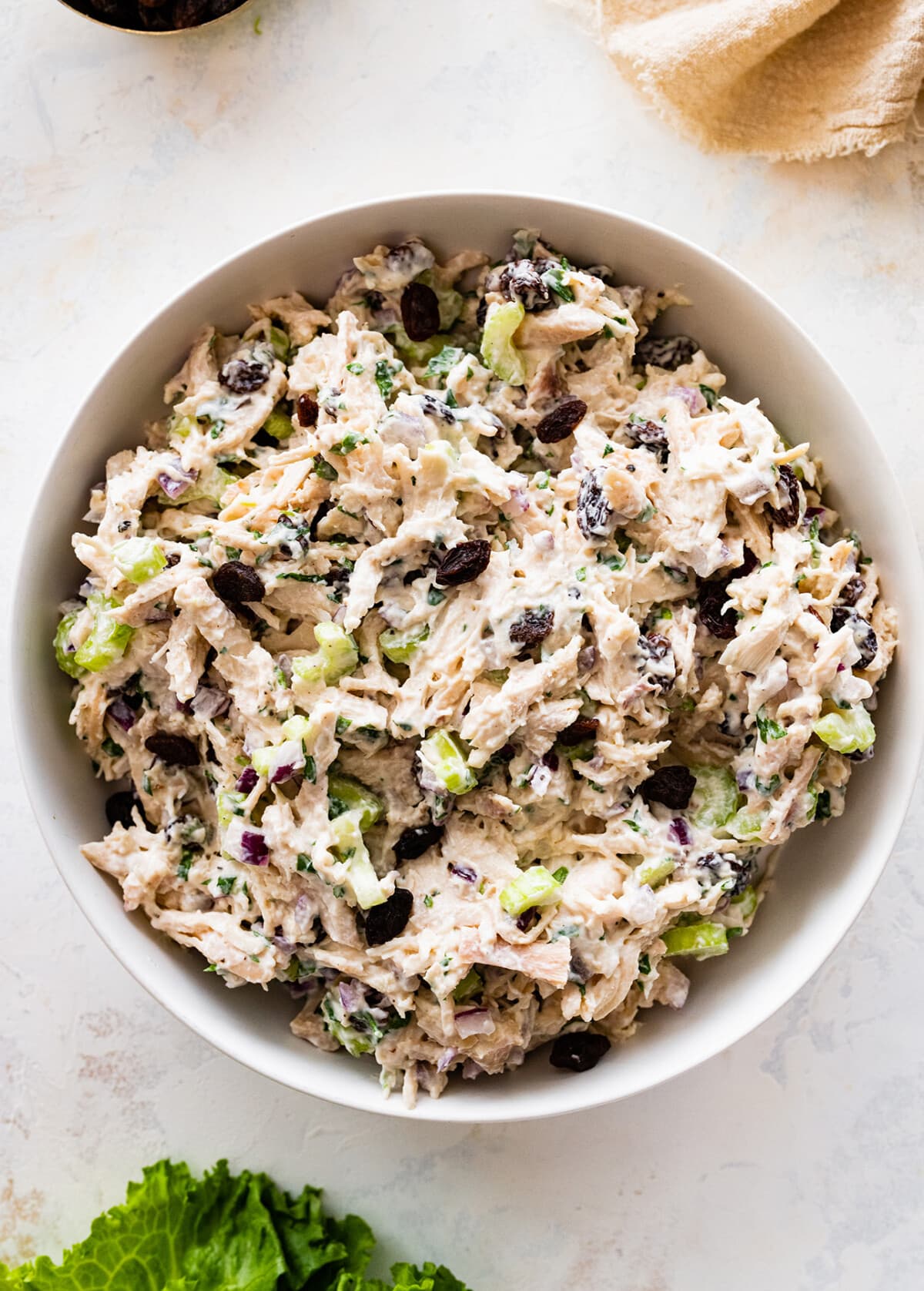 Tarragon chicken salad in a white serving bowl.