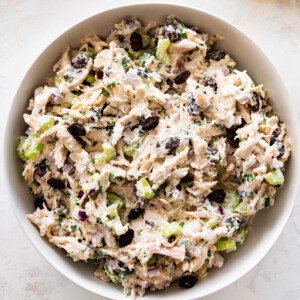 Tarragon chicken salad in a white serving bowl.