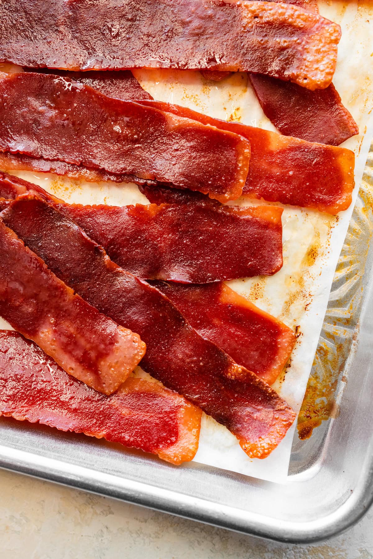 Turkey bacon on a baking tray.