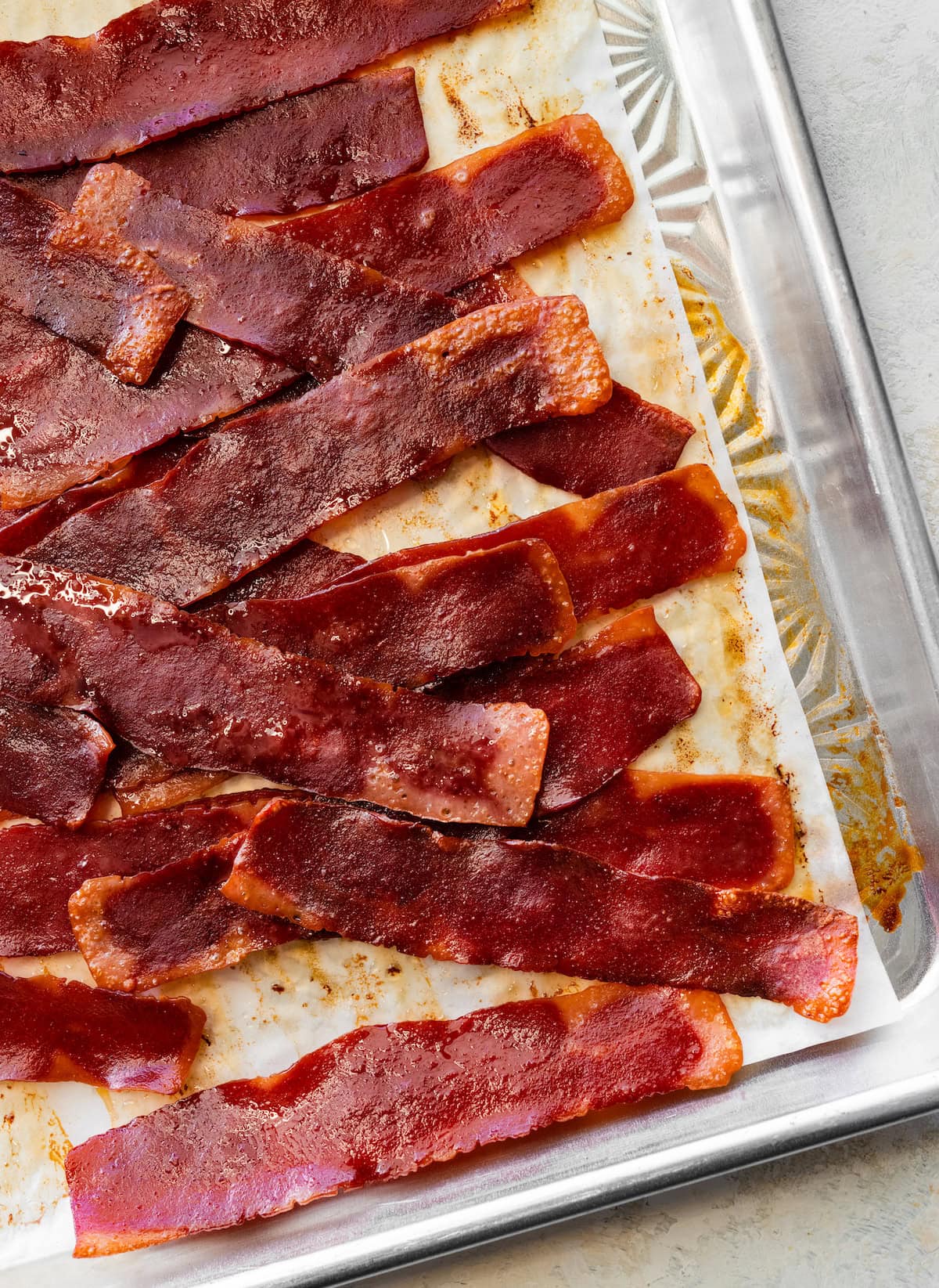 Turkey bacon on a baking tray.