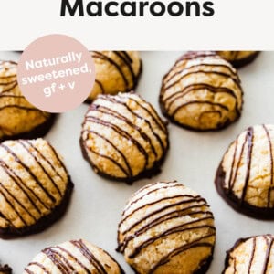 Coconut macaroons drizzled with chocolate.