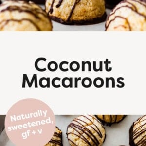 Coconut macaroons drizzled with chocolate. Som macaroons are stacked, some are on parchment paper.