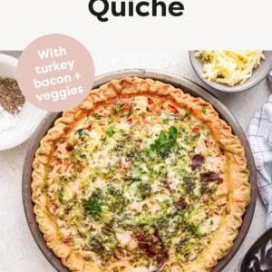 Egg White Quiche surrounded by bowls of ingredients like herbs, spices and cheese.