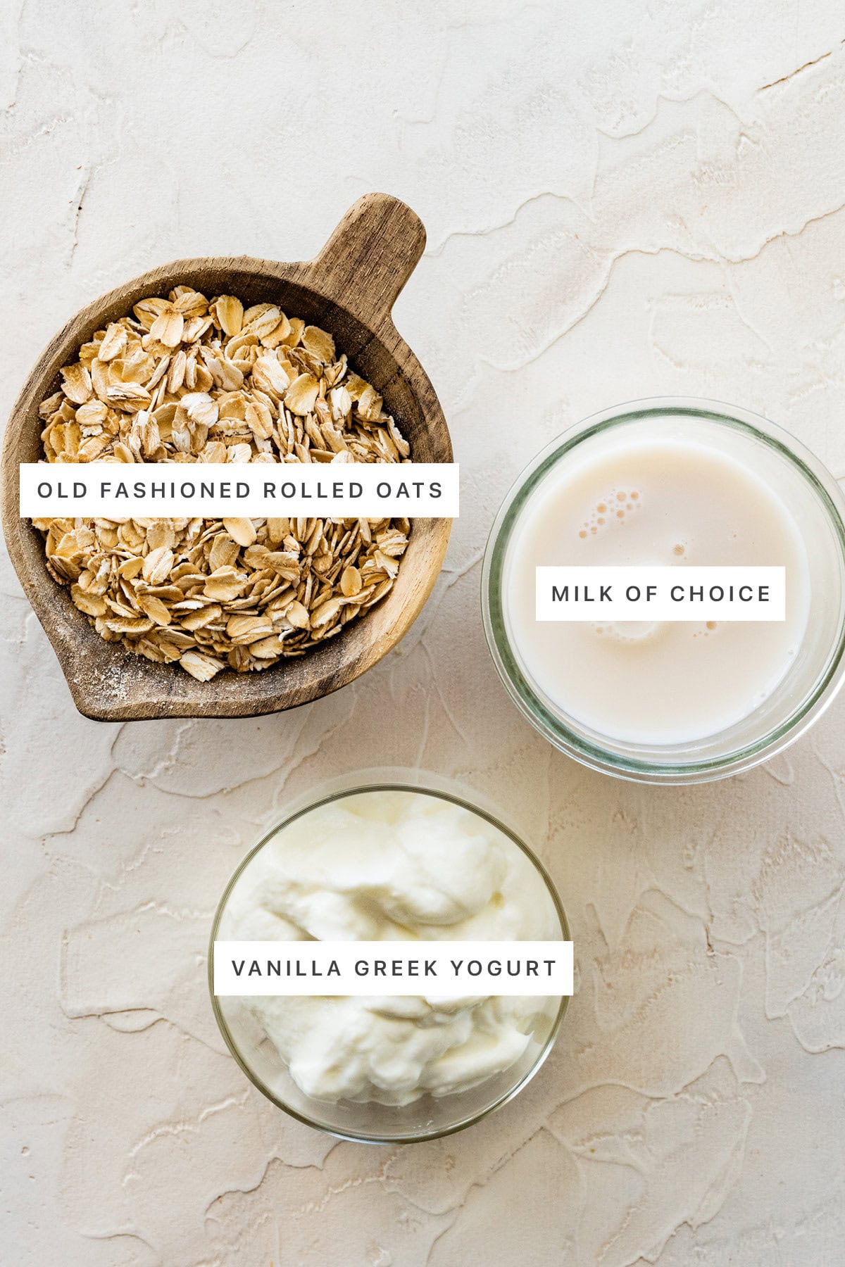 Ingredients measured out to make Overnight Oats with Yogurt: rolled oats, milk and vanilla Greek yogurt.