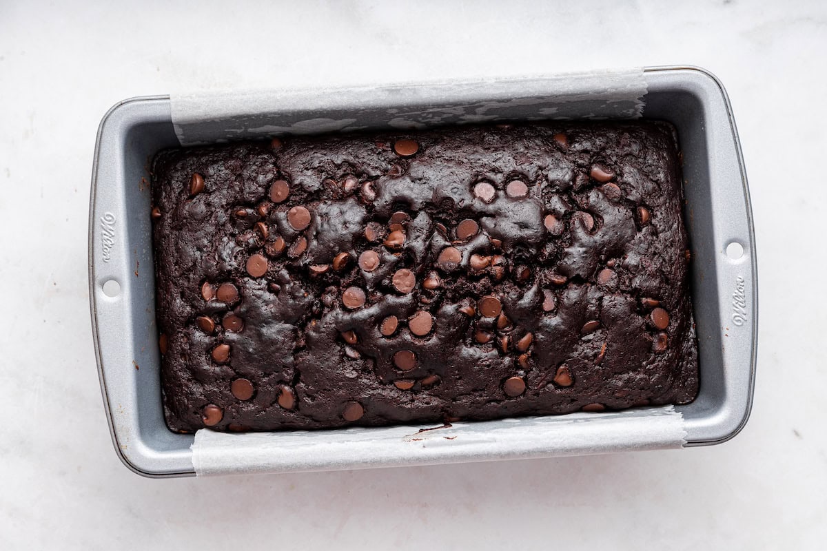 Chocolate zucchini bread in a bread pan.