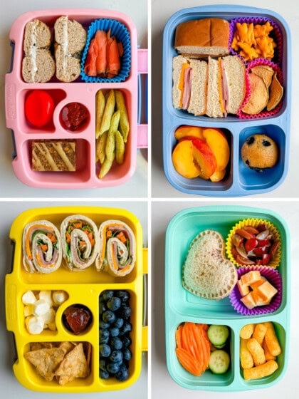 Four bento style kid's lunch boxes filled with different snacks, sandwiches and fruits.