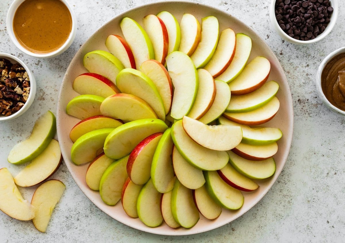 A large plate of apple slices.