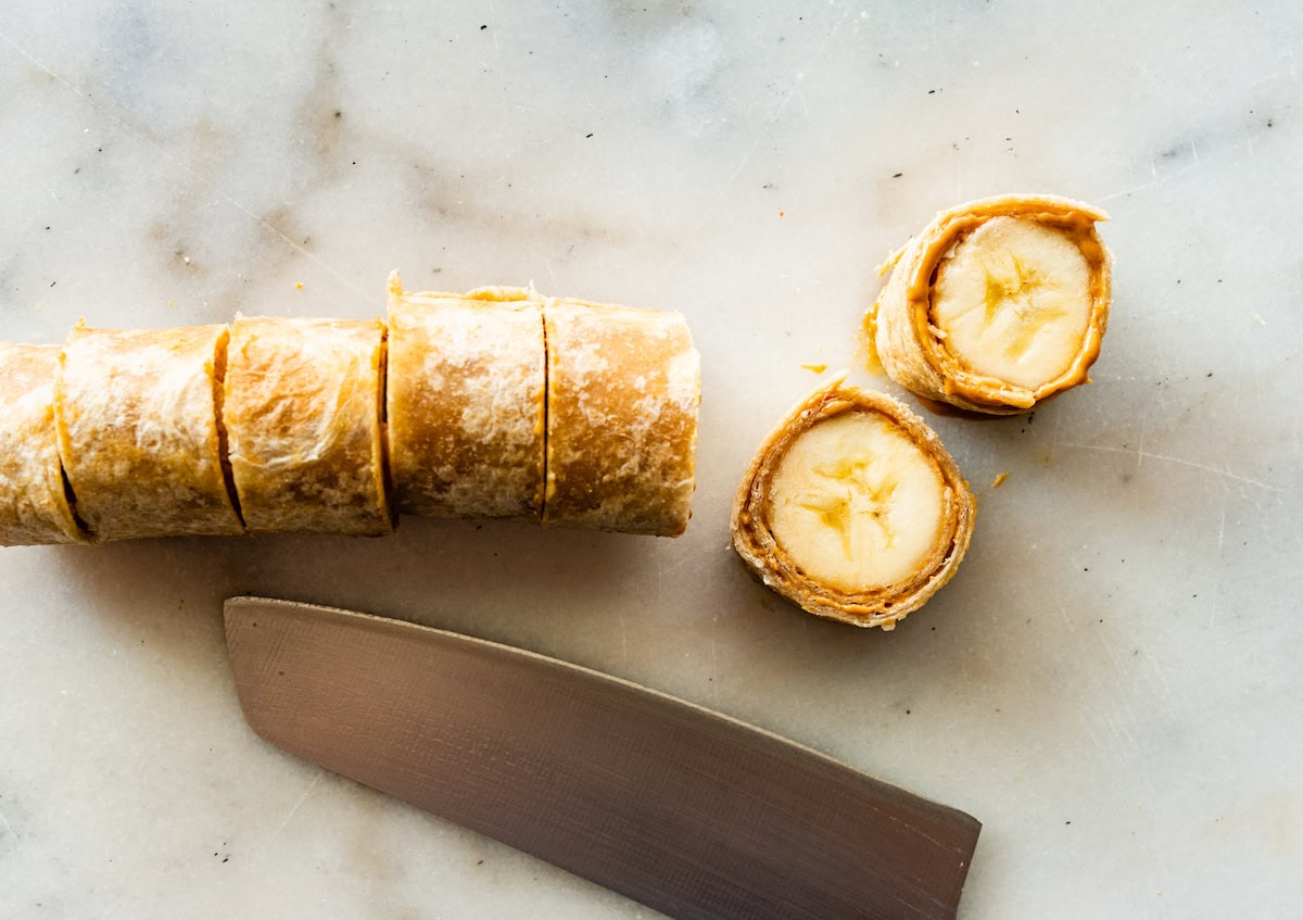 A banana roll up cut into sushi-like pieces.