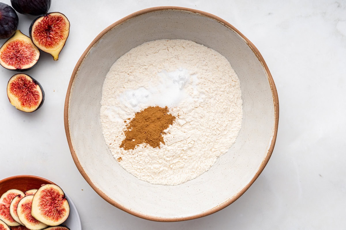 A bowl of all the dry ingredients used for a fig bread.