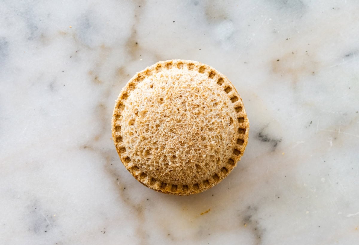 An peanut butter and jelly uncrustable on a counter top.