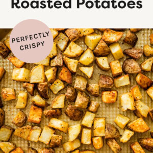 Cubes of Roasted Potatoes on a sheet pan.