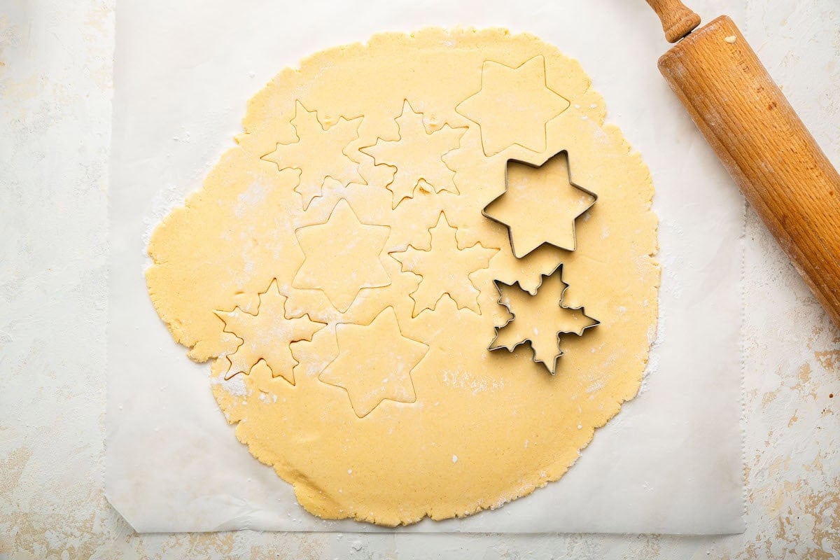 Star shaped cookie cutters used to cut out gluten free sugar cookies.
