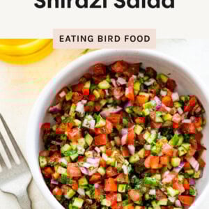 Overhead photo of Shirazi Salad in a bowl with a fork next to it.