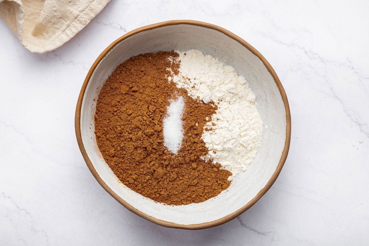 The dry ingredients for the peanut butter brownies in a mixing bowl.
