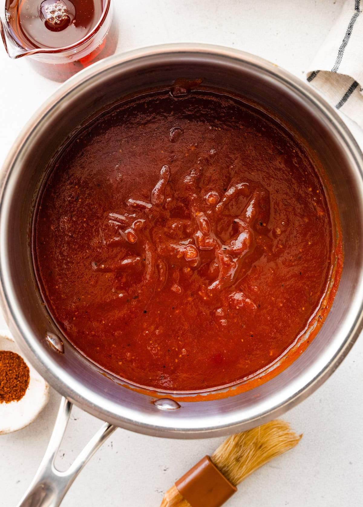 Cooked homemade BBQ sauce in a saucepan.