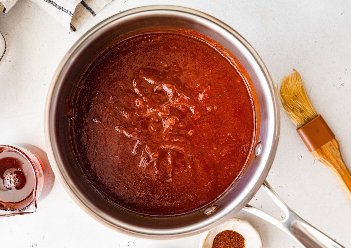 Cooked homemade BBQ sauce in a saucepan.