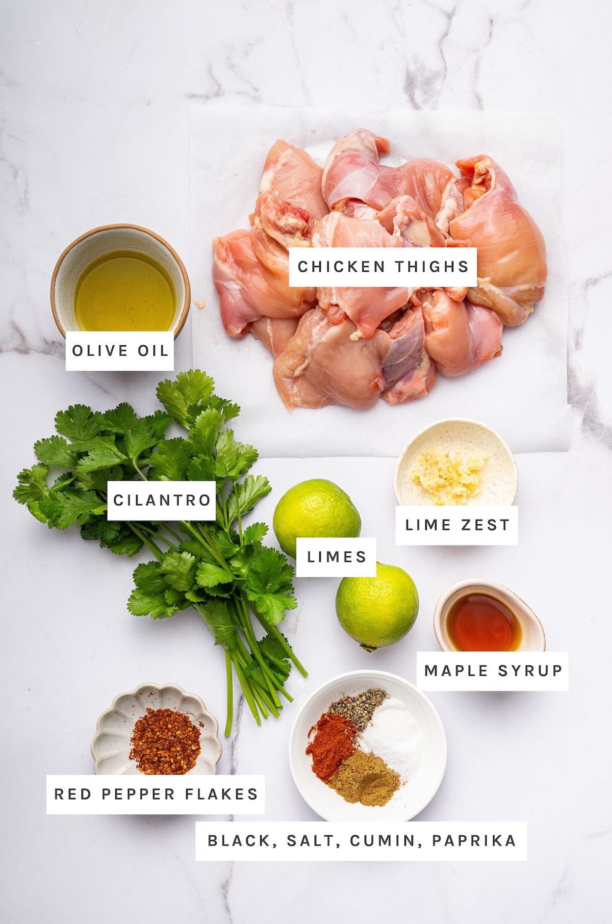 Cilantro Lime Chicken ingredients: Chicken thighs, Olive oil, Cilantro, Limes, Lime zest, Maple syrup, Red pepper flakes, Black pepper, Salt, Cumin, Paprika