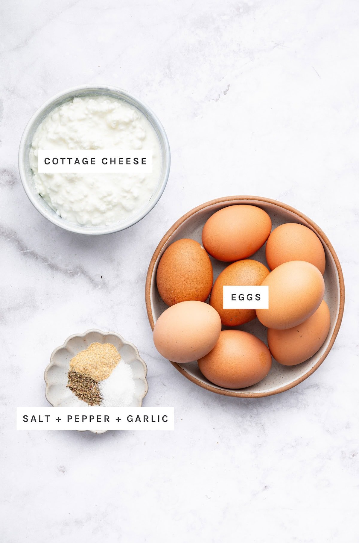 Cottage Cheese Egg Bites ingredients: Cottage cheese, eggs, salt, pepper, garlic powder.