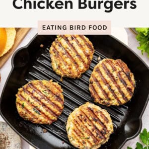 Grilled chicken burgers cooking on a grill pan, perfect for summer grilling.