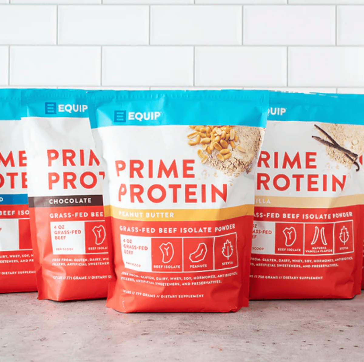 Bags of Equip Prime Protein: peanut butter, vanilla, chocolate and unflavored.