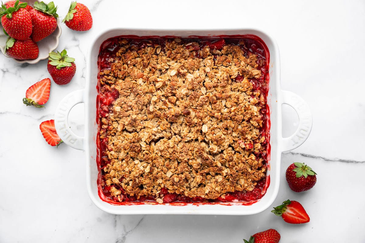 Baked strawberry crisp with an oat almond protein crumble.