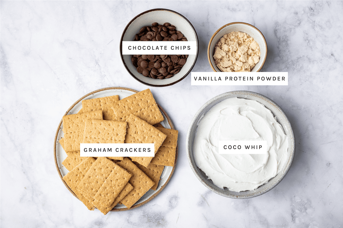 Frozen S'mores ingredients: Graham crackers, chocolate chips, vanilla protein powder, coco whip