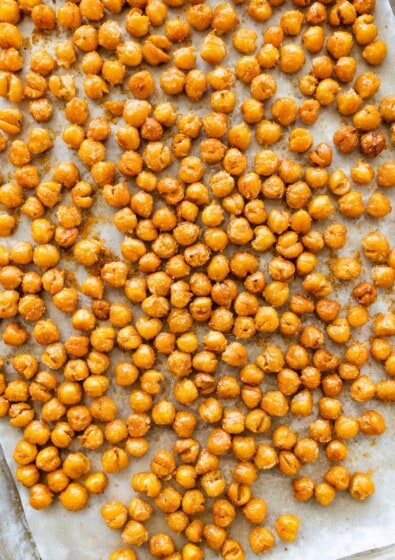 Crispy oven roasted chickpeas showing golden, crunchy texture.