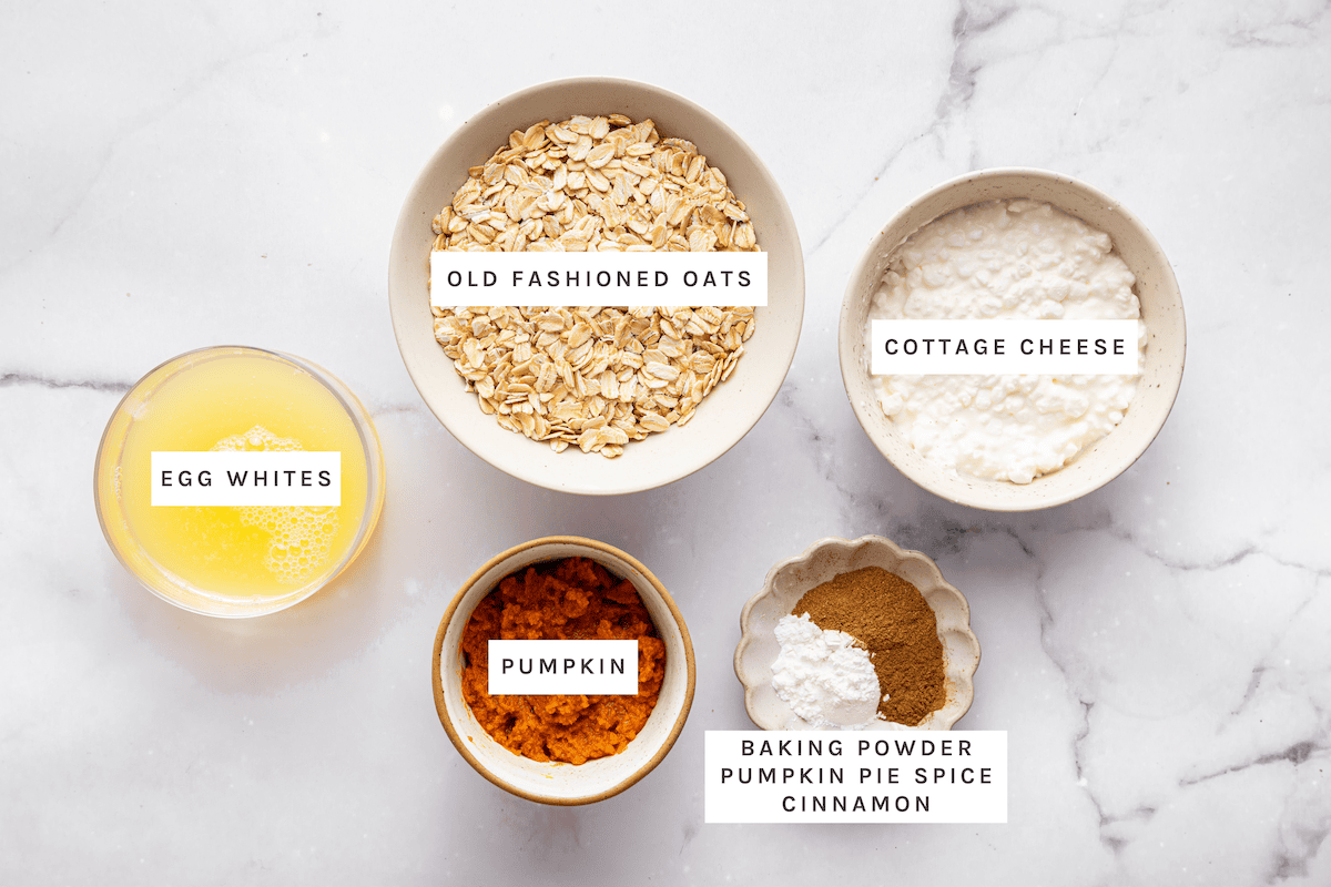 Healthy Pumpkin Pancake ingredients: Egg whites, old fashioned oats, cottage cheese, pumpkin, baking powder, pumpkin pie spice, cinnamon