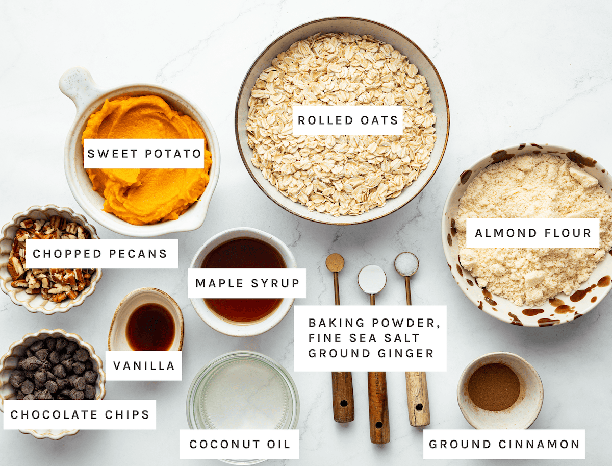 Sweet Potato, Rolled Oats, Almond Flour, Chopped Pecans, Maple Syrup, Vanilla, Chocolate Chips, Coconut Oil, and a mixture of Baking Powder, Fine Sea Salt, and Ground Ginger, and Ground Cinnamon.